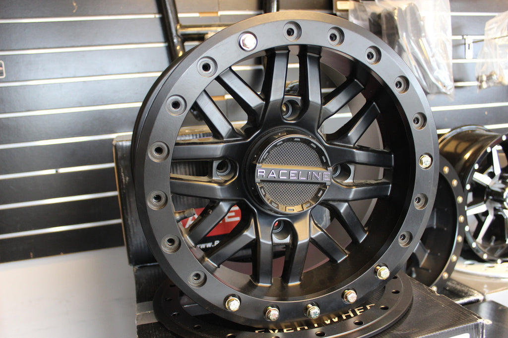 NEW Raceline Ryno Beadlock 14x7 4/156 5+2 offset set of 4 with Lugs